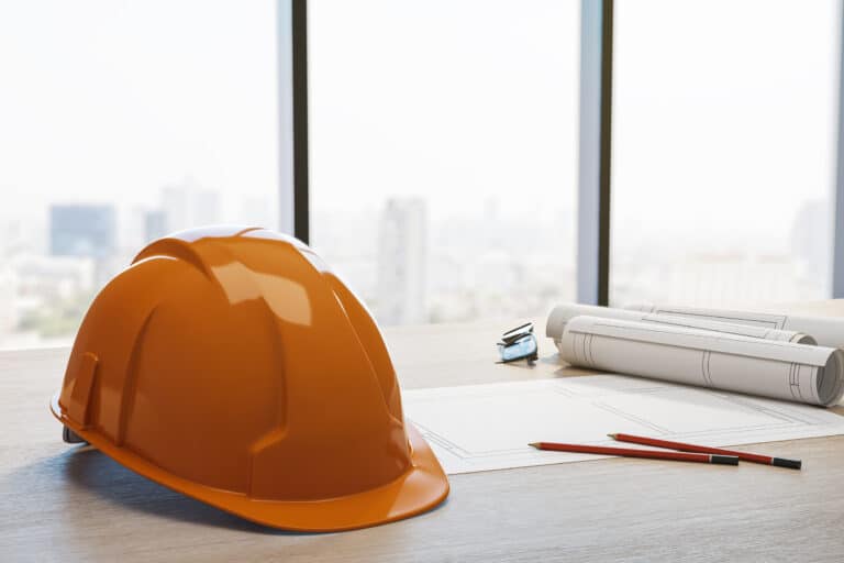 Safety helmet, blueprints, rolled plans and pencils in realistic 3D Rendering on bright office background, construction concept